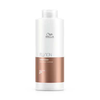 Acondicionador reparador Wella Fusion en botella blanca con etiqueta marrón