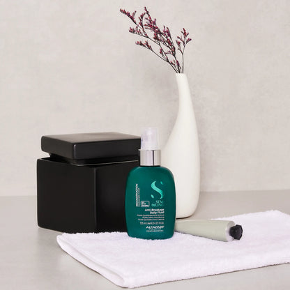 Fluido diario anti-quiebre y protector térmico para cabello dañado – Reparación y brillo sin peso | Semi Di Lino Reconstruction 125 ml